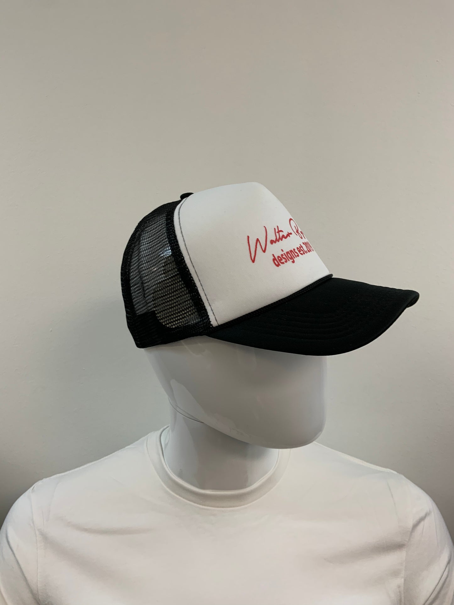 Red, white and black trucker hat